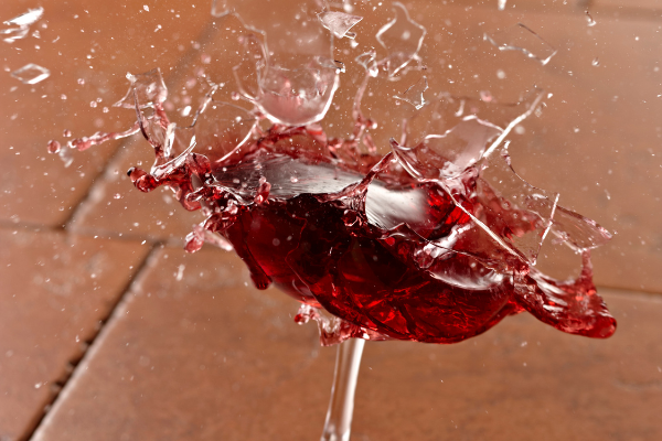 a smashed red wine glass